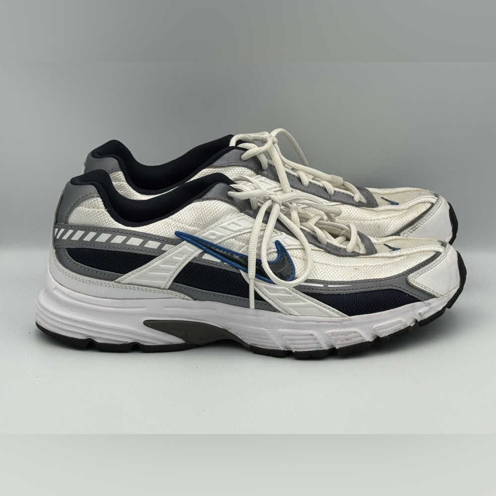 Nike White and Blue Sneakers with Streamlined Design